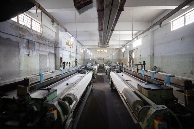 Textile machinery at the non-operational Al Karim Weaving factory in Karachi, Pakistan
