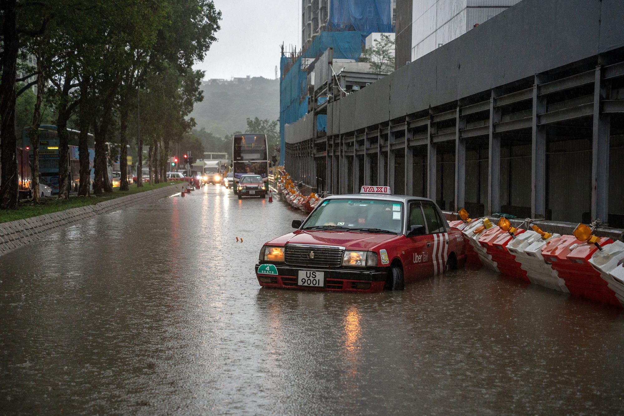 Hong Kong Issues 2024’s First Red Storm Signal Amid Flooding - Bloomberg