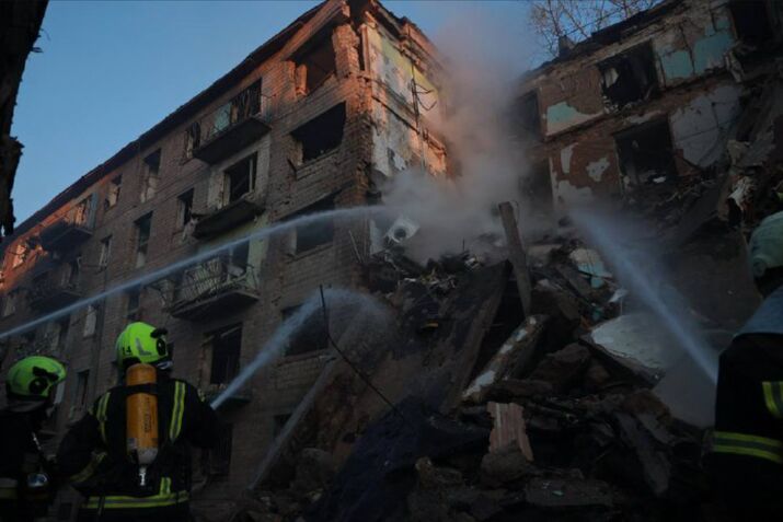 Emergency services attend the site of a Russia attack in Kyiv, in a photo released on June 23.
