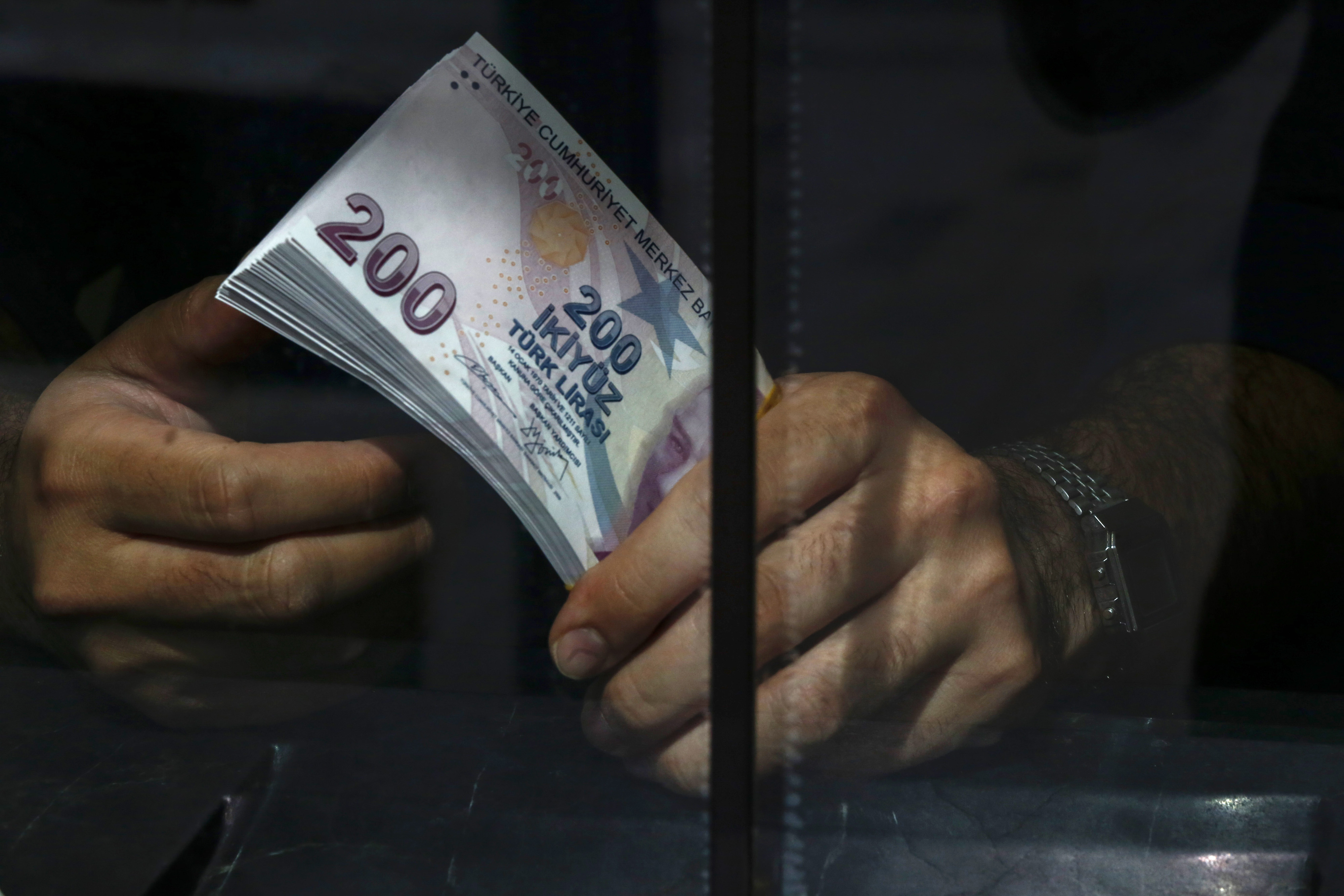 The Turkish currency was little changed after the decision.