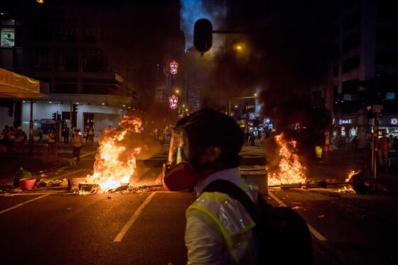 Hong Kong Protesters Battle Police, Set Fire to Key Subway Station