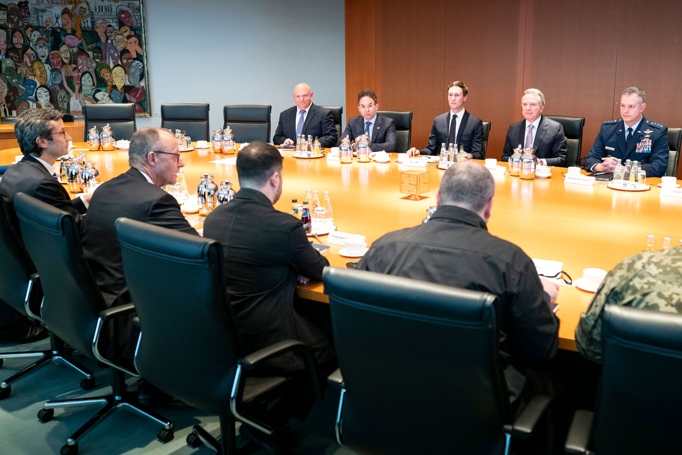 Friedrich Merz, left, Steve Witkoff, top second right, and Volodymyr Zelenskiy, center, in Berlin, in this photo released by the German Government Press Office (BPA) on Dec. 14. Photographer: Guido Bergmann/Bundesregierung/Getty Images