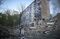 A damaged apartment building following a Russian combined missile and drone attack, in Kyiv on June 17.
