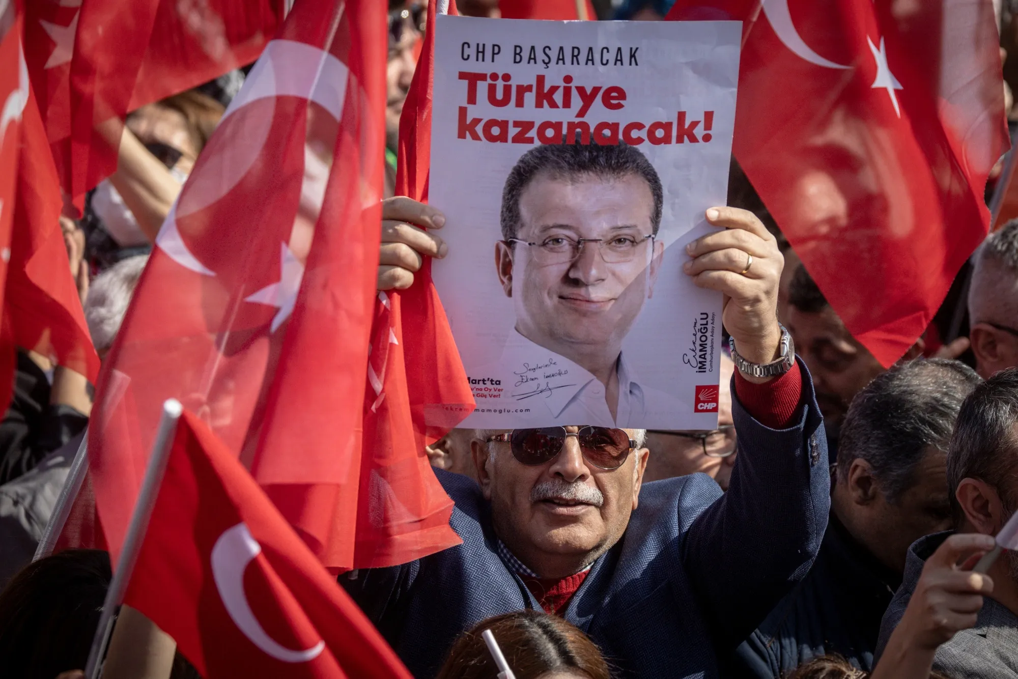 A supporter with a poster of Ekrem Imamoglu during a protest rally&nbsp;in Istanbul, on March 29.