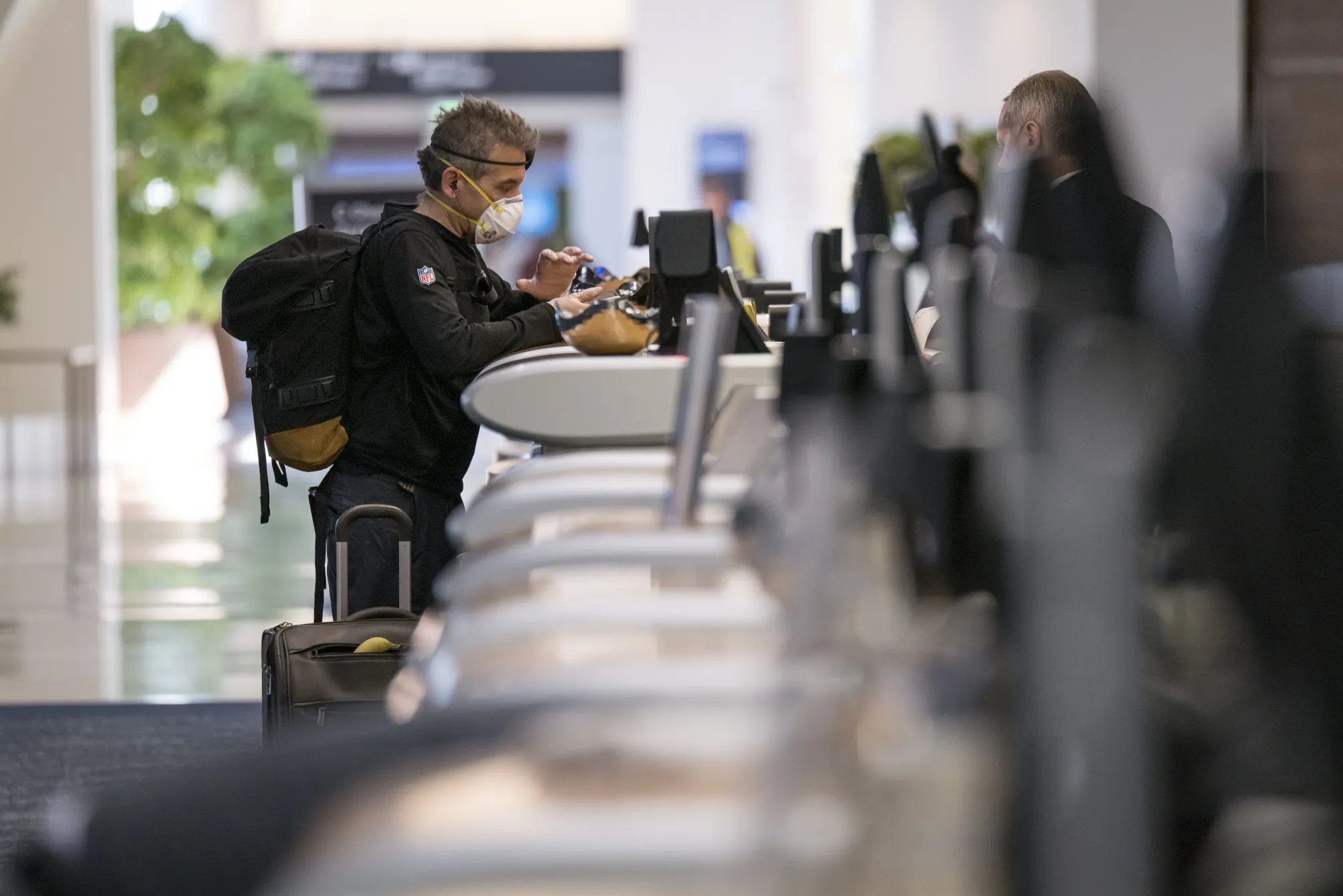 A traveler&nbsp;checks in at San Francisco International Airport in&nbsp;California, on&nbsp;April 2.&nbsp;