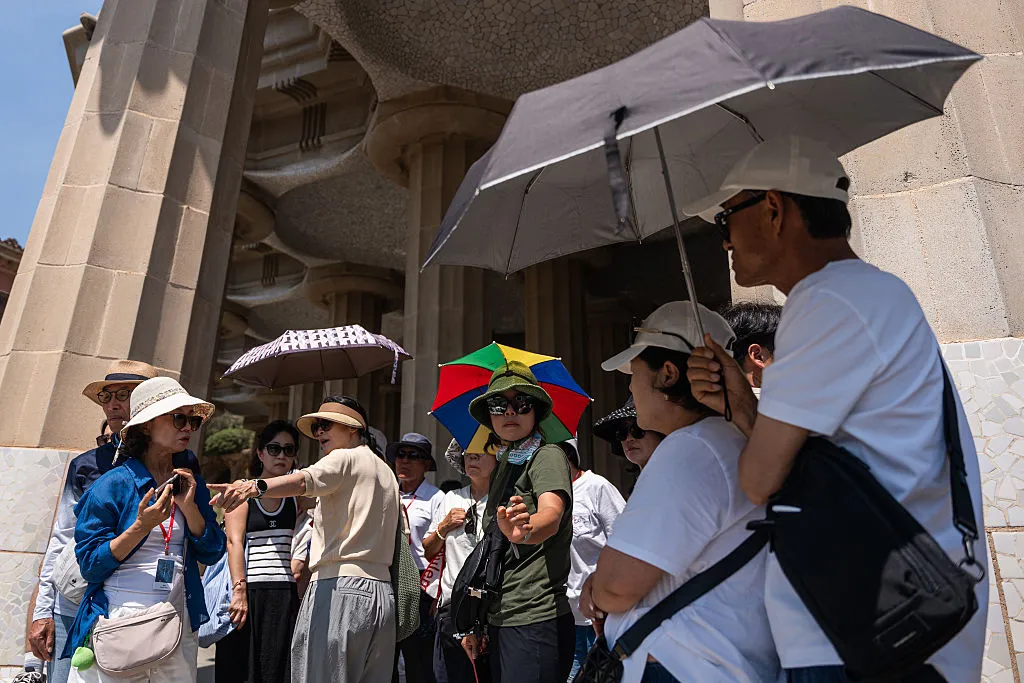 Tourists at Park Guell during a hot morning in Barcelona, Spain, on July 6.&nbsp;