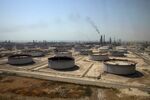 Crude oil storage tanks at the Juaymah Tank Farm in Saudi Aramco's Ras Tanura oil refinery and oil terminal in Ras Tanura, Saudi Arabia.