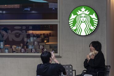 Starbucks Stores in Shanghai as Coffee Chain Is Said to Consider Selling Stake in Chinese Business