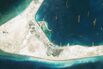 DigitalGlobe high-resolution imagery of the Subi Reef in the South China Sea, a part of the Spratly Islands group. Photo DigitalGlobe via Getty Images.