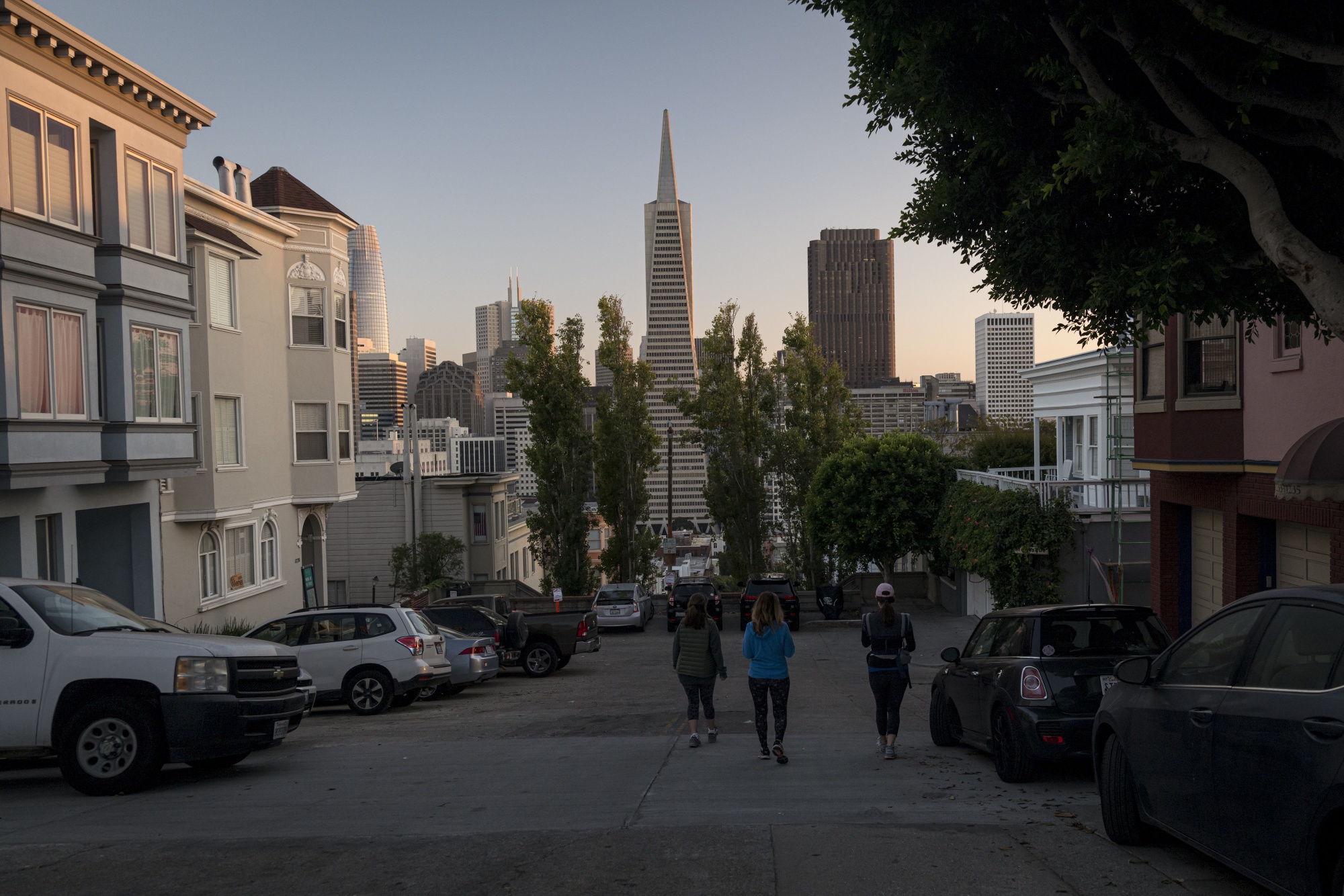 Pedestrians walk on a street in San Francisco, California.