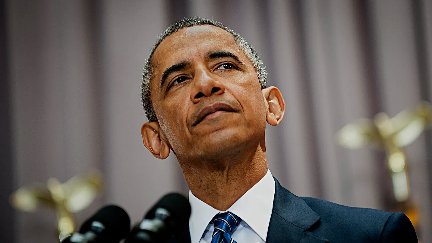 U.S. President Barack Obama pauses while speaking at American University's School of International Service in Washington, D.C., U.S., on Wednesday, Aug. 5, 2015.
