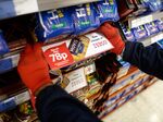 relates to Tesco Surprises as U.K. Grocer Posts Increase in Christmas Sales