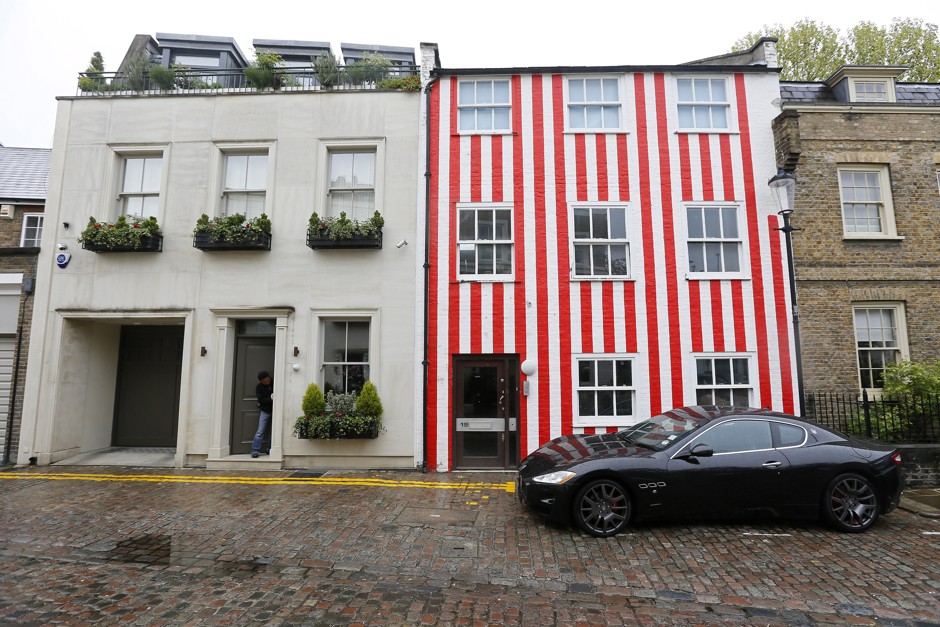 A painted &quot;spite&quot; house is seen in the Kensington section of London on April 29, 2015. 