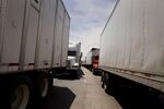 Trucks wait to enter the U.S. from Mexico.