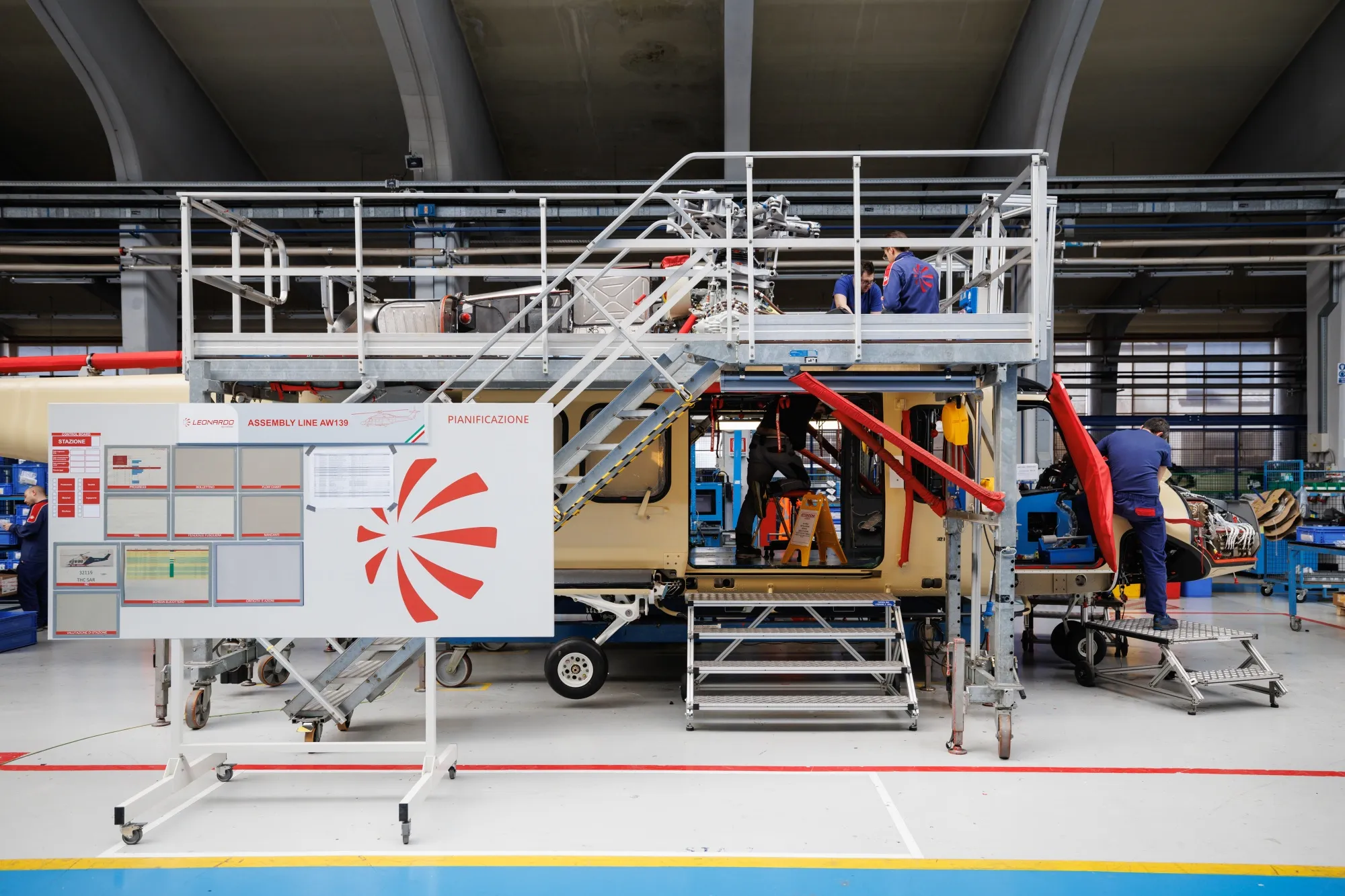 Workers assemble a Leonardo AW139 helicopter at the Leonardo SpA plant in Varese.