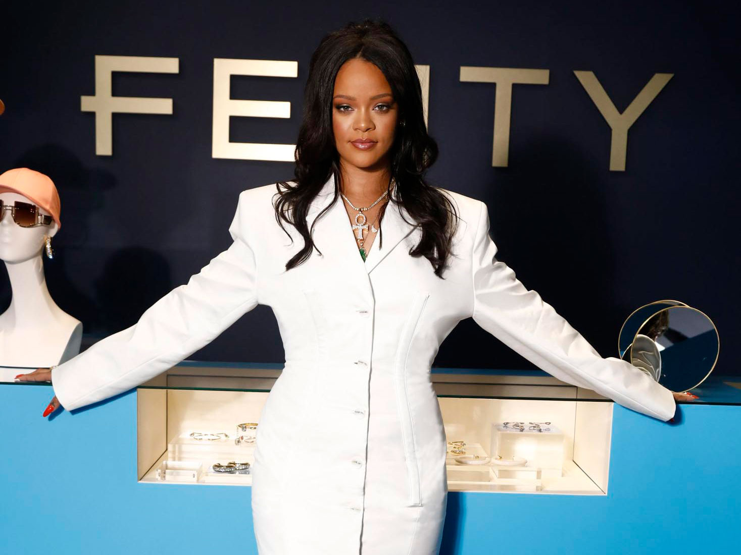 Rihanna shows off her fashion credentials in khaki miniskirt at Fenty  clothing launch in Paris
