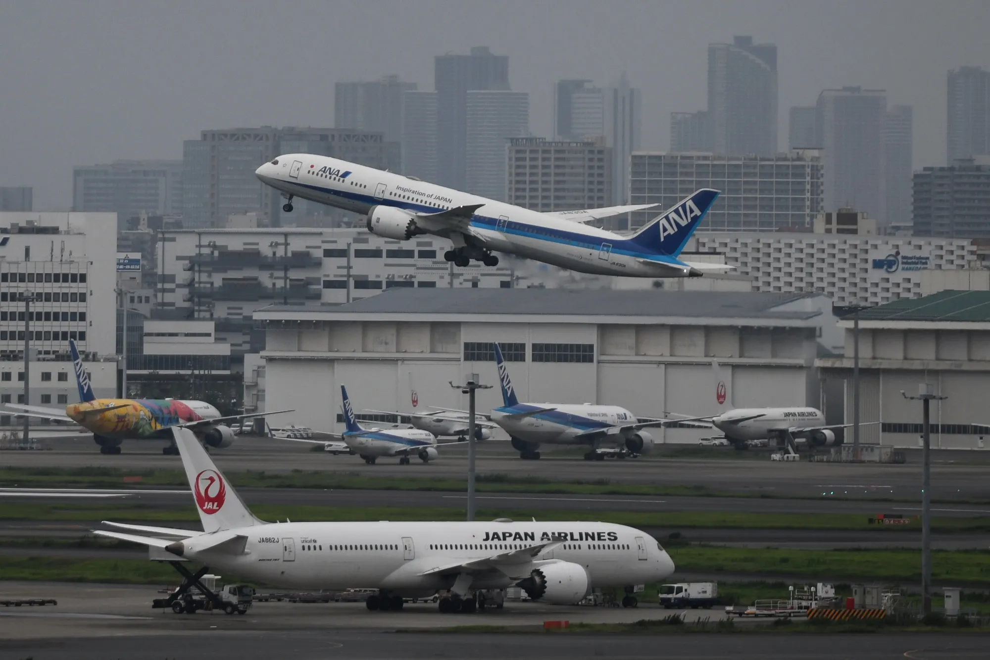 An All Nippon Airways Co. (ANA) aircraft takes off at Haneda Airport in Tokyo.