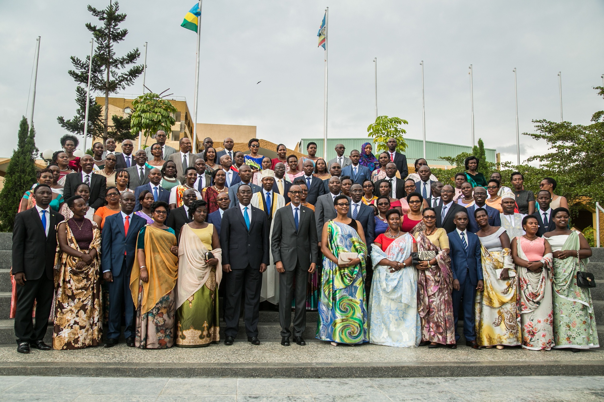 Rwanda's President Paul Kagame poses with 80 new members of parliament on September 19, 2018.
