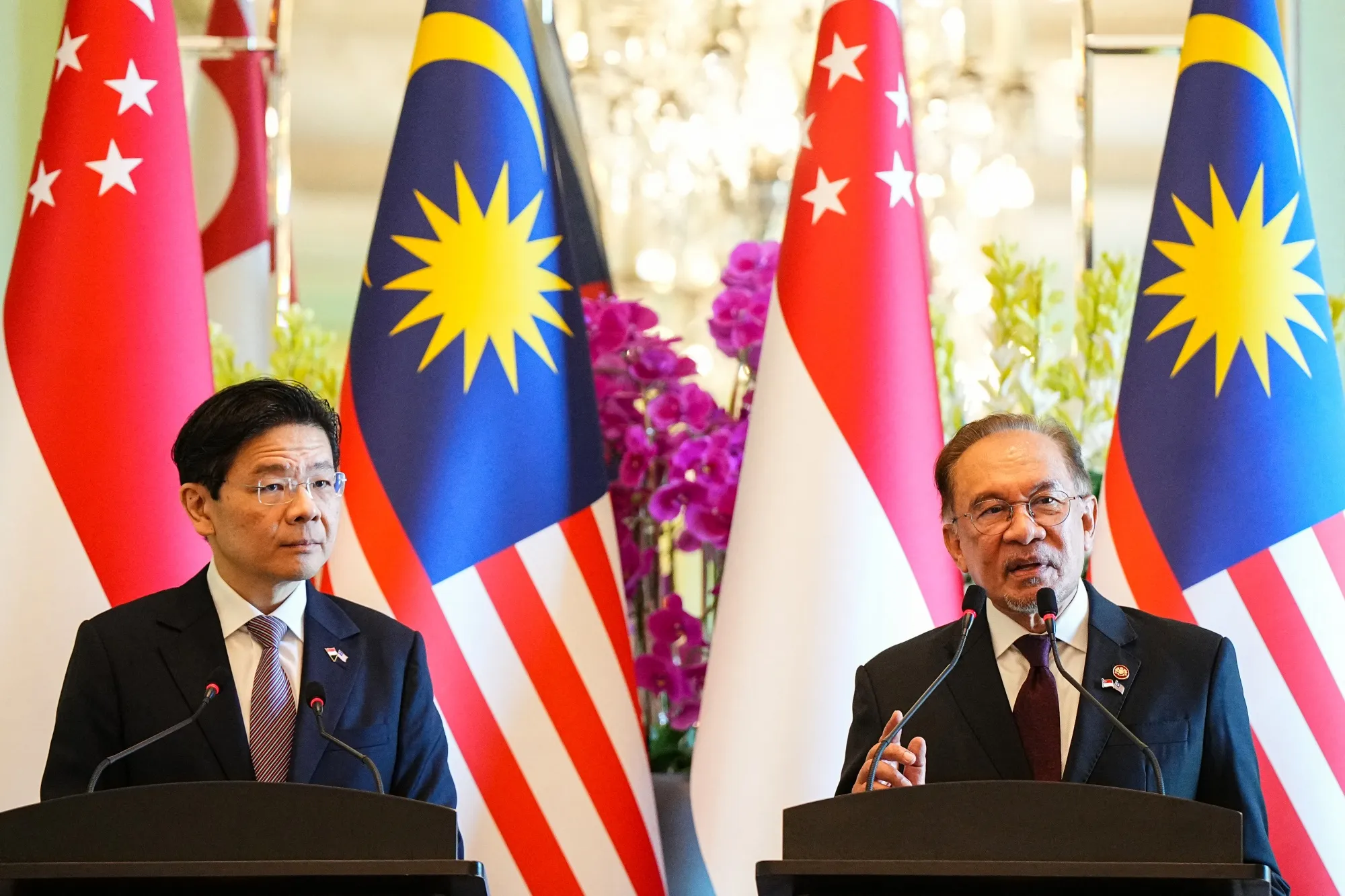 Anwar Ibrahim, right, with Singapore’s Lawrence Wong in Putrajaya on Jan. 7.