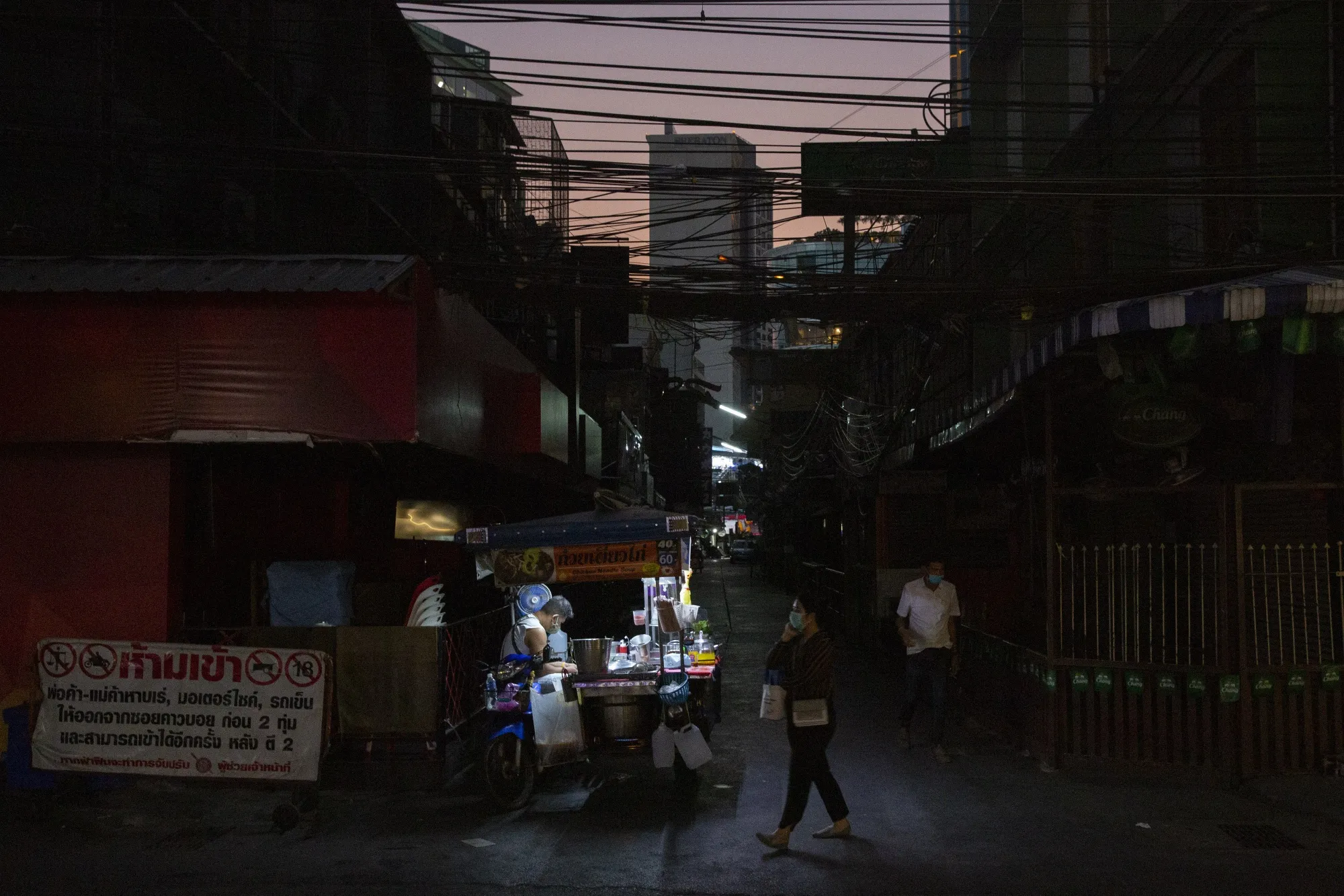 The popular nightlife spot in Asoke has been almost completely shut down due to coronavirus lockdown measures in Bangkok, Thailand, on March 30.