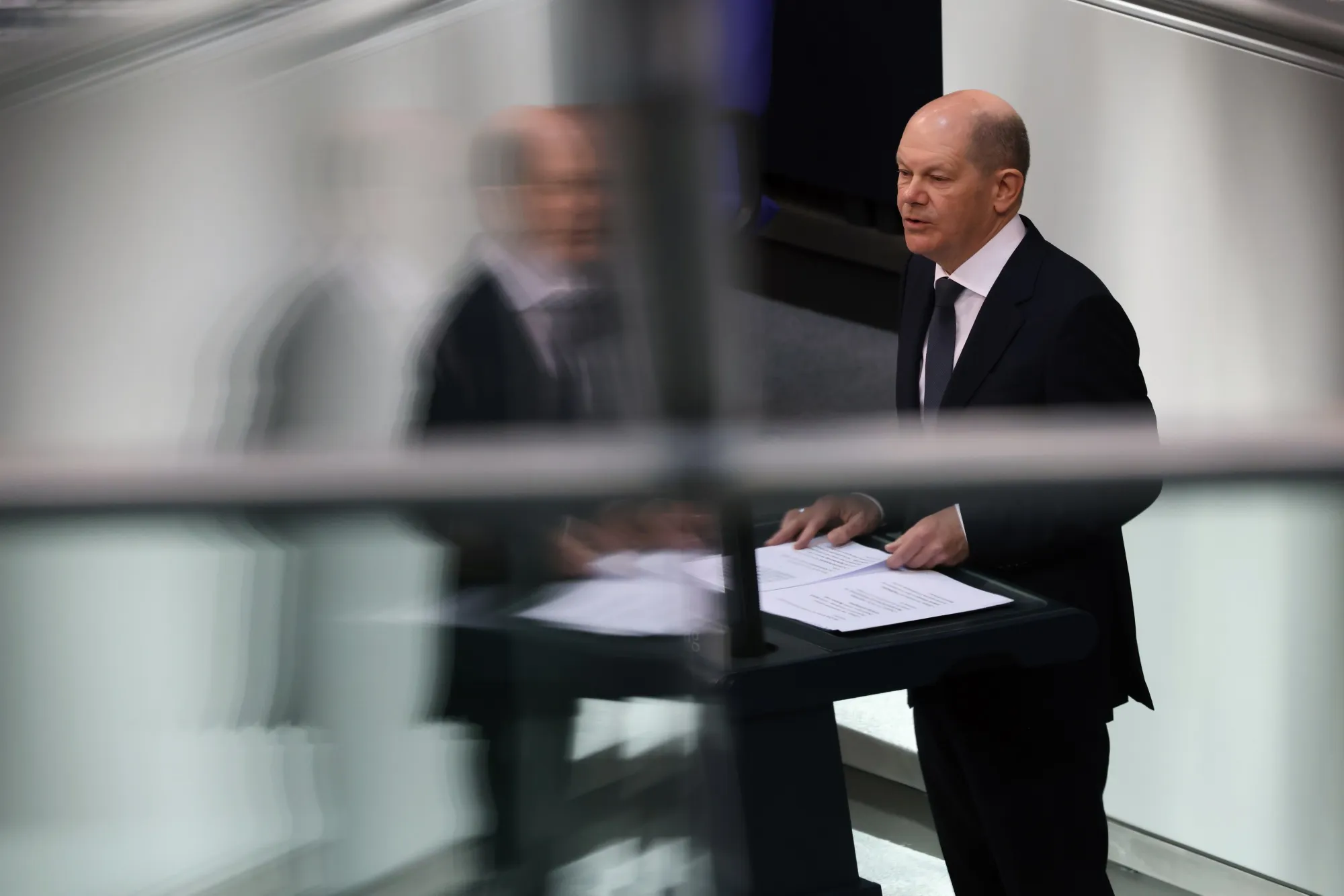 Olaf Scholz speaks at the Bundestag in Berlin, on March 23.