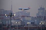 An aircraft approaches Haneda Airport,Tokyo.
