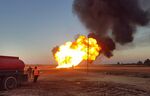 Flames rise from the site of the gas pipeline blast near Damascus, Syria, on Aug. 24.
