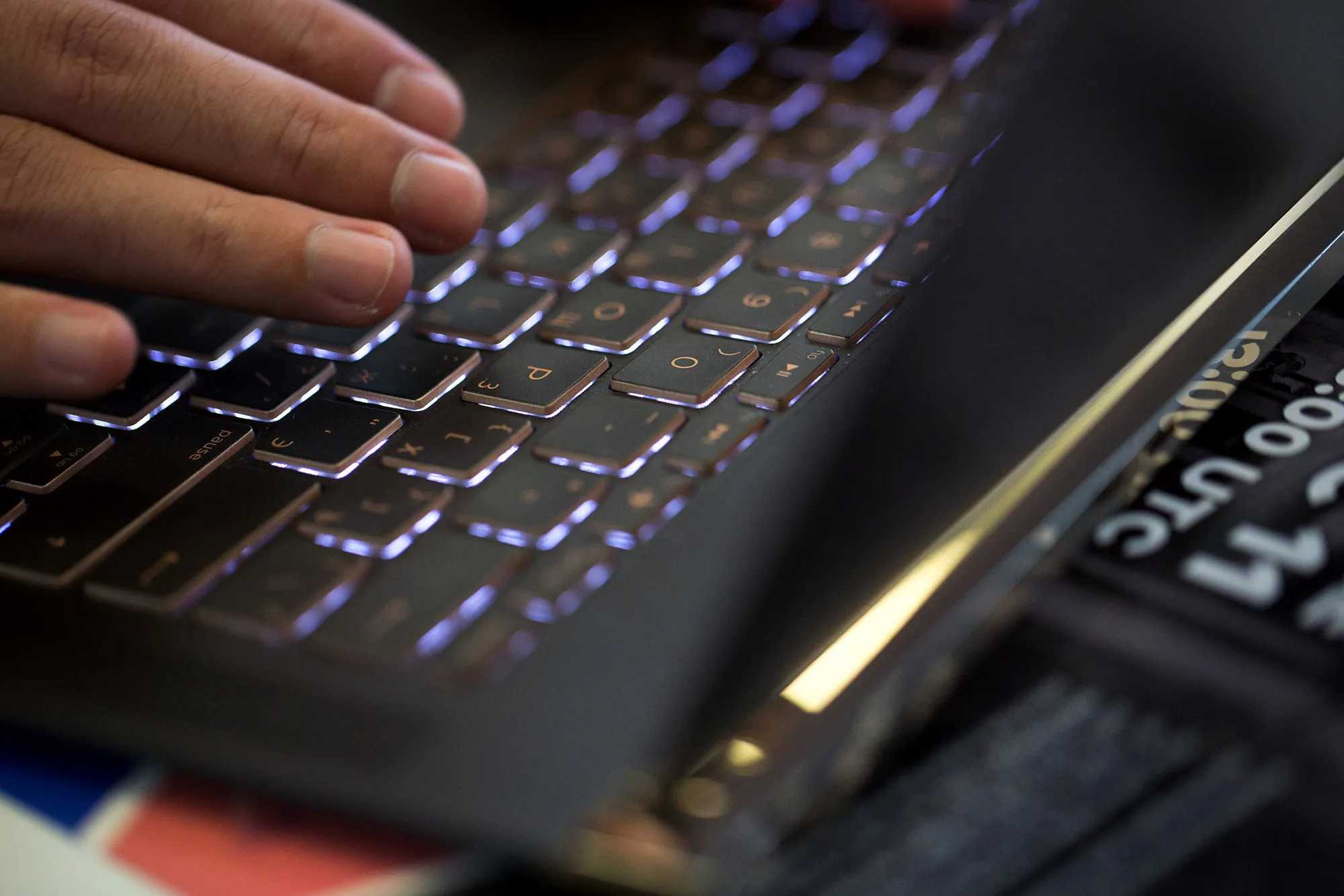 A person&nbsp;types on a laptop