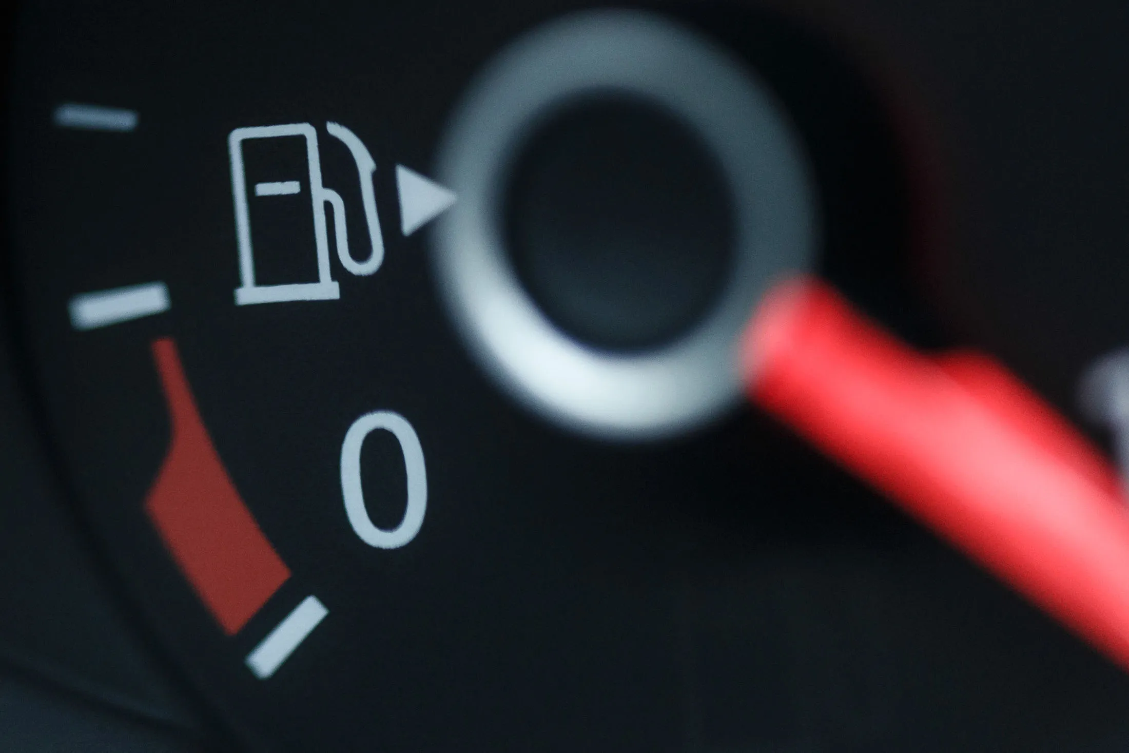 A fuel gauge sits on a dashboard of a Volkswagen AG Passat TDI automobile.
