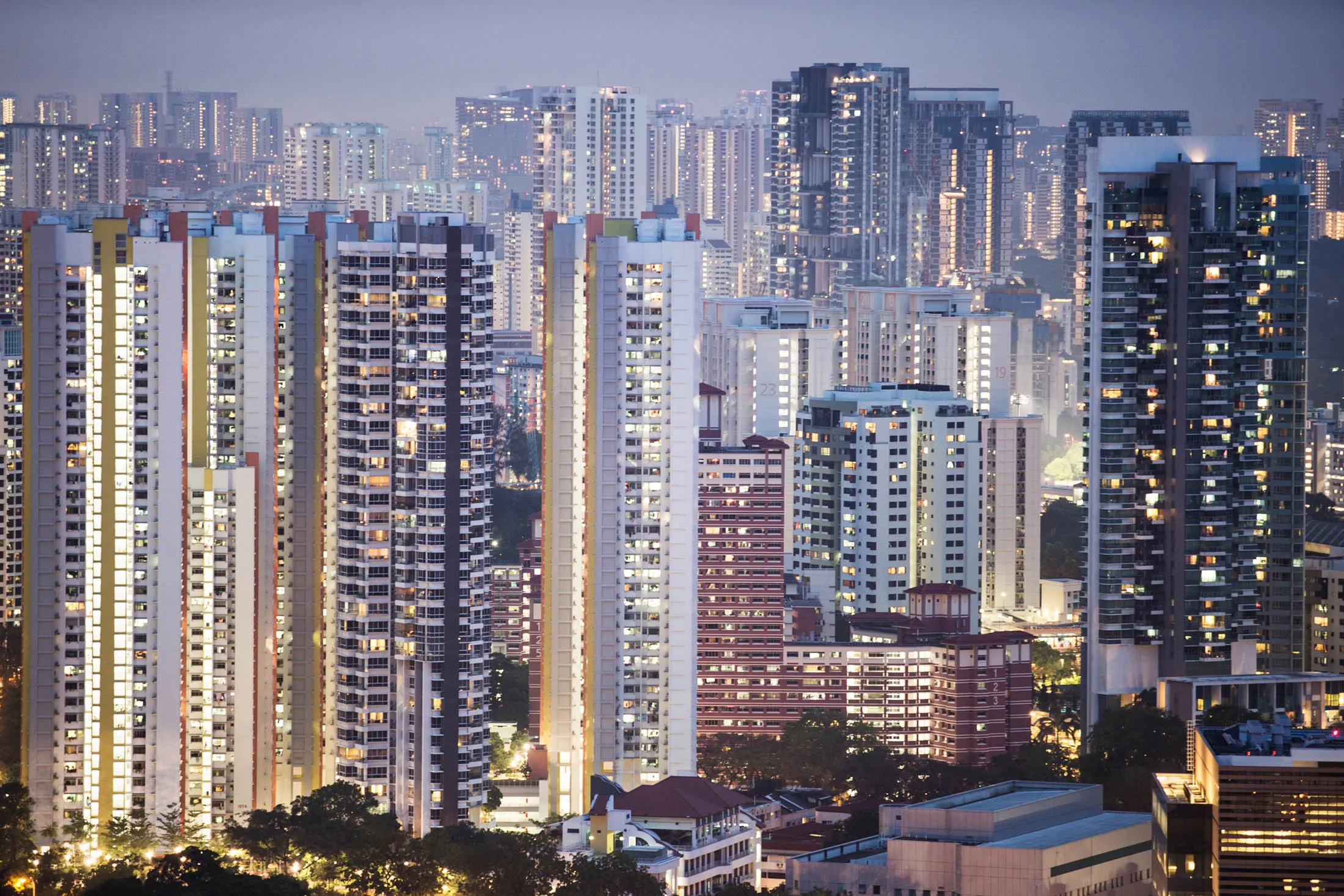 Residential buildings stand in Singapore, on Sunday, March 22, 2015. Lee Kuan Yew, who helped transform Singapore from a colonial trading center into one of Asia's most prosperous nations during 31 years as its first elected prime minister, has died. He was 91.
