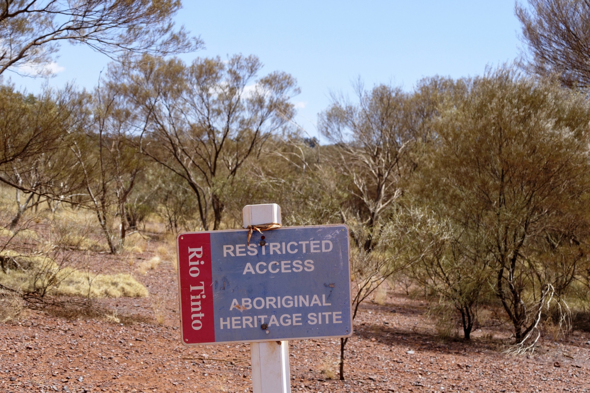 A Rio Tinto sign marks an Aboriginal heritage site sign in Pilbara.