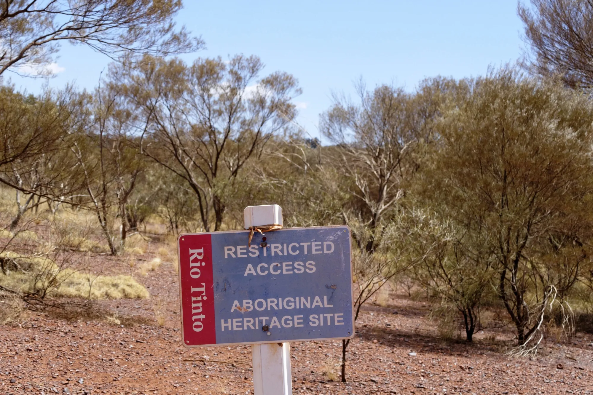 A Rio Tinto sign marks an Aboriginal heritage site sign in Pilbara.