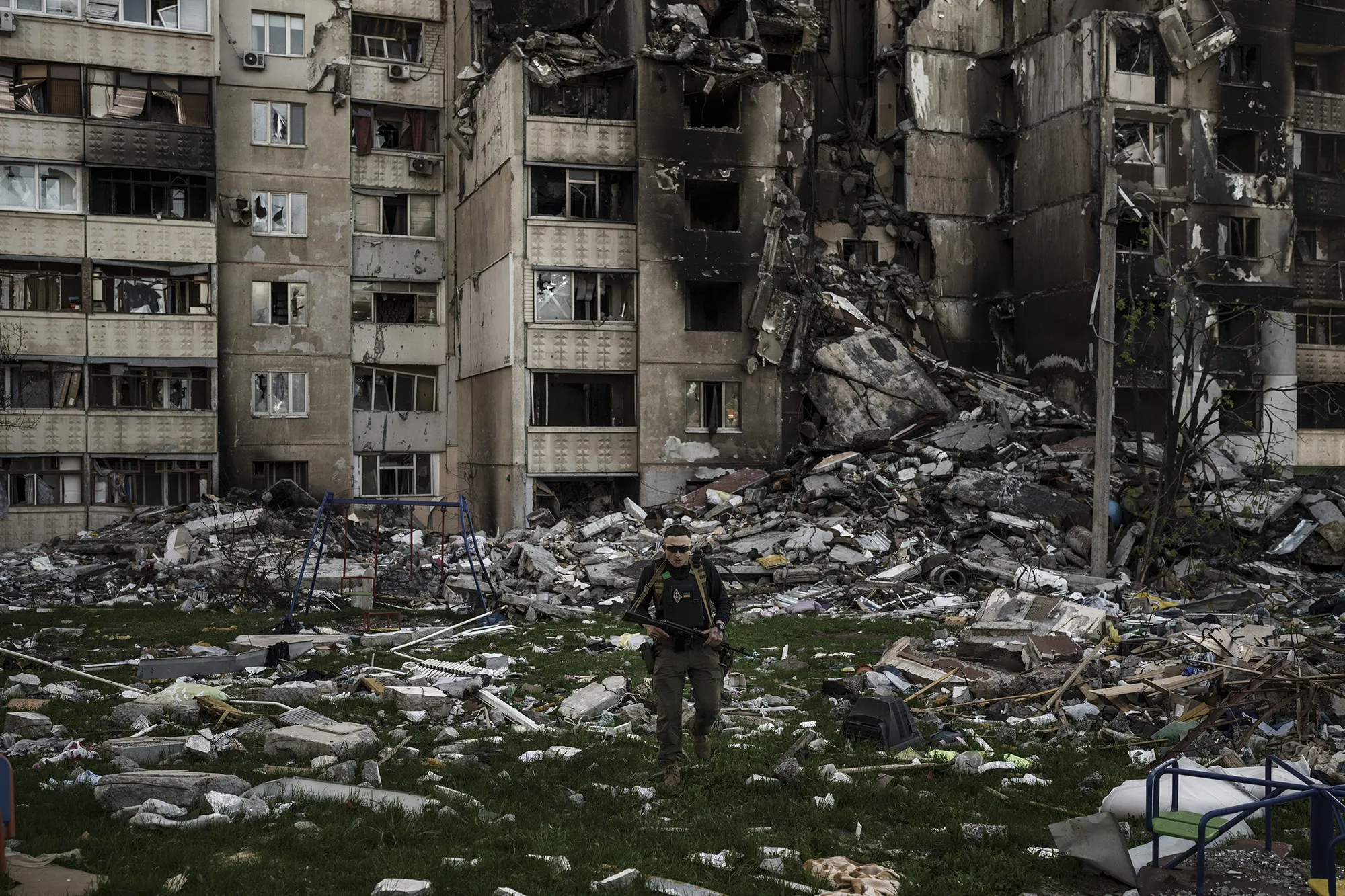 A Ukrainian serviceman walks amid the rubble of a building heavily damaged by multiple Russian bombardments near a frontline in Kharkiv, Ukraine, on April 25.