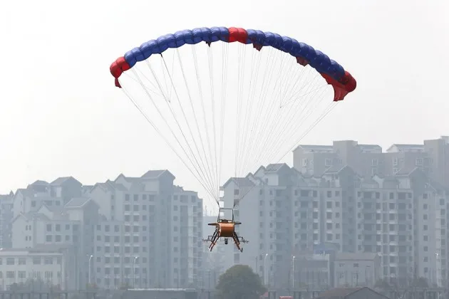 A drone flies during a smog-clearing test at the Shashi Airport in Jingzhou city, in central China’s Hubei province