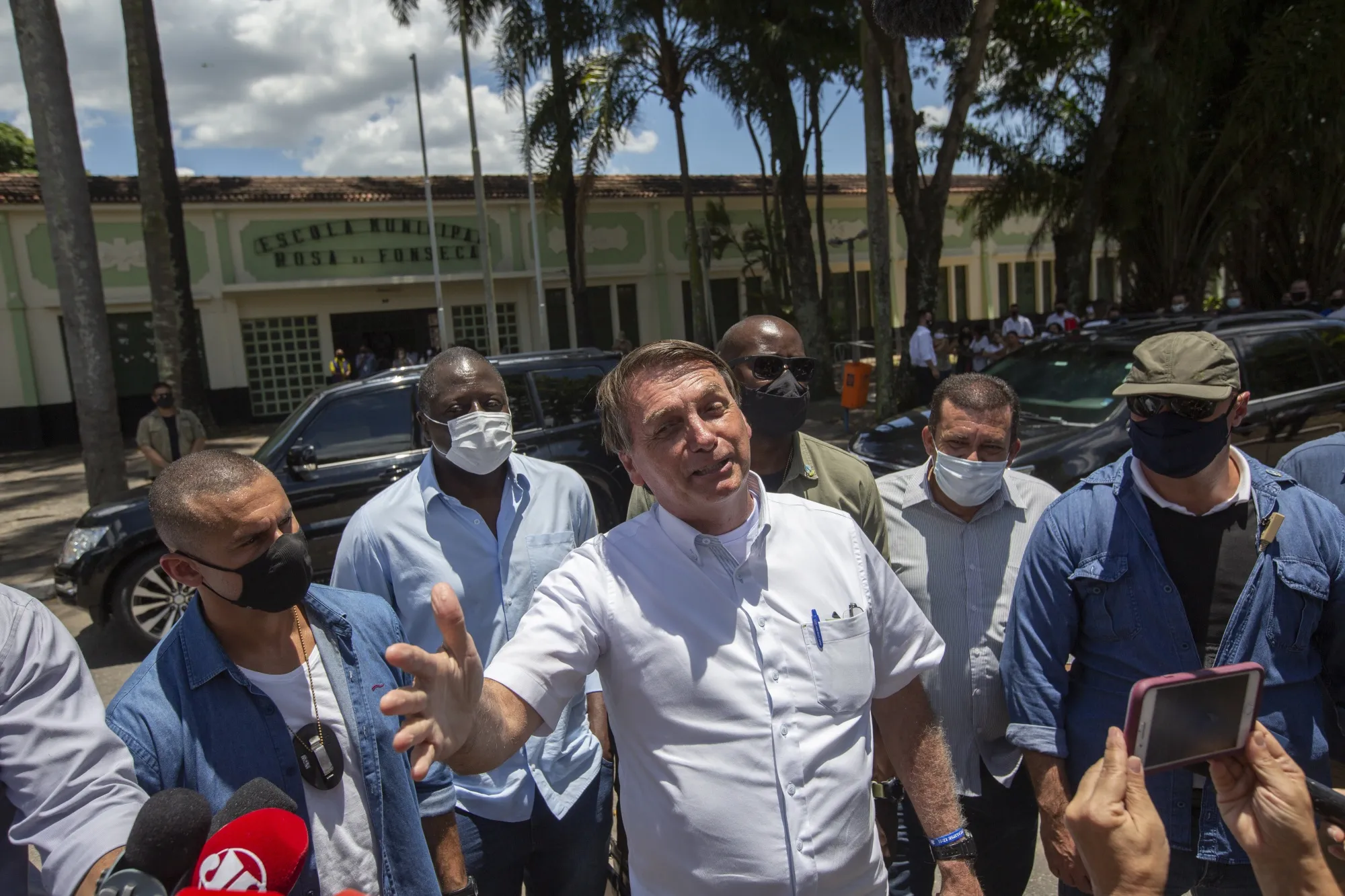 Jair Bolsonaro speaks to members of the media during the second round of the municipal elections in Rio de Janeiro, Brazil, on Nov. 29.
