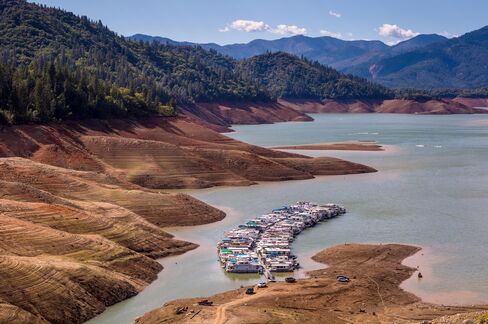 With Lake Shasta at 26% capacity, California's largest water reservoir, feeding the Sacramento River, is at historically low levels on Sept. 27, 2014, in Redding, Calif. With 2013 the driest year in recorded history, and reservoir levels continuing to drop, Governor Jerry Brown has declared a water