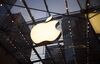 The Apple Inc. logo is displayed at the Upper West Side Apple store in New York, U.S., on Sunday, July 20, 2014. Apple Inc. is expected to release earnings data on July 22.