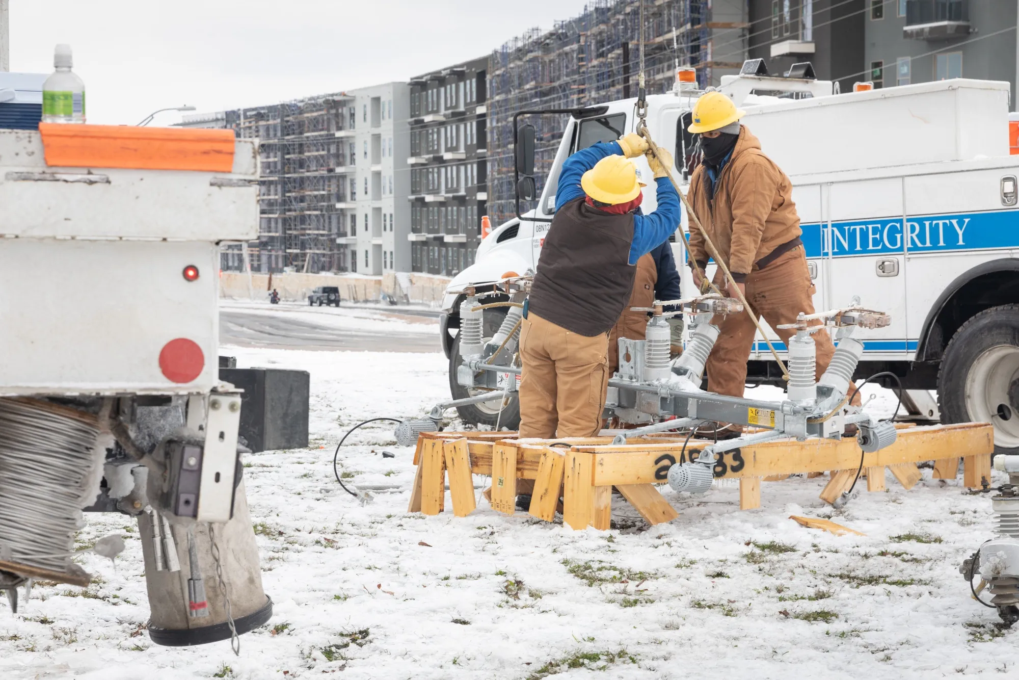 Workers repair a power line in Austin, Texas, on Feb. 18.