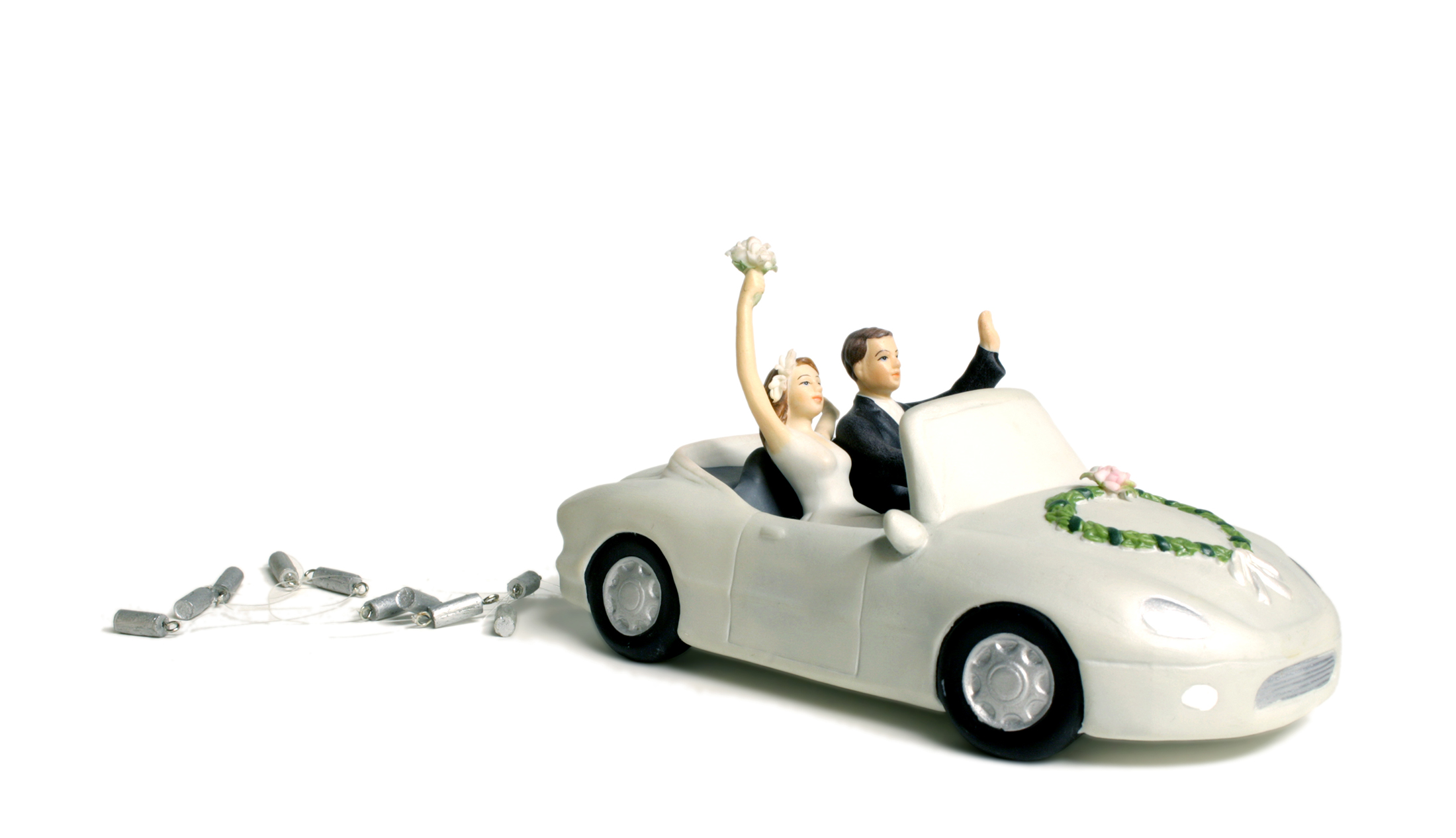 Bride and groom in a car cake topper