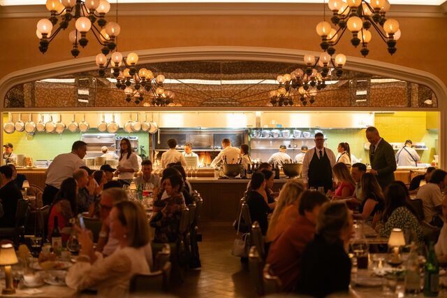 People dining inside Mother Wolf.