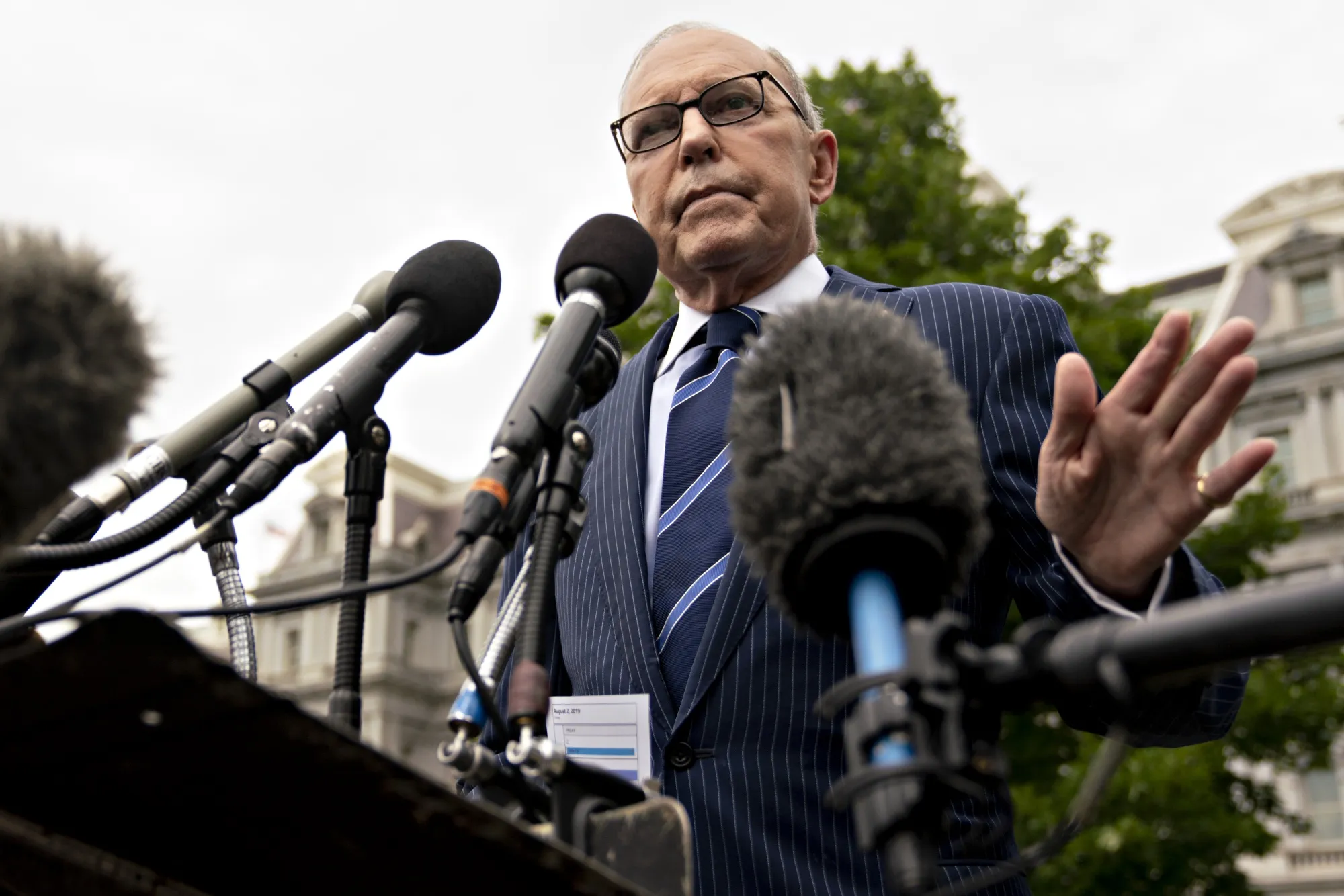 Larry Kudlow speaks to members of the media outside the White House in Washington, D.C. on Aug. 2, 2019.