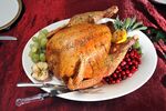 A sage roasted turkey on a holiday table at Mazzone Hospitality Corporate Headquarters Wednesday Nov. 12, 2014, in Clifton Park, NY. (Photo by John Carl D'Annibale/Albany Times Union via Getty Images)