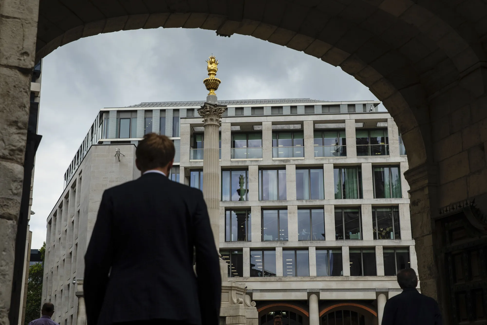 Pedestrians pass the London Stock Exchange Group Plc headquarters in the City of London.