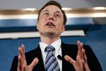 Musk speaking at a news conference at the National Press Club in Washington