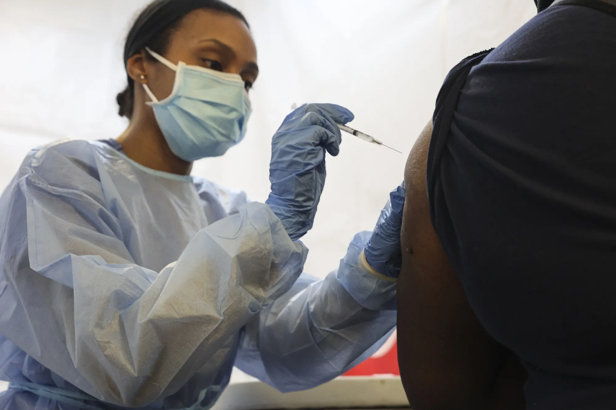 A healthcare worker administers the Pfizer BioNTech Covid-19 vaccine&nbsp;in the Bronx borough of New York,&nbsp;on Feb. 5.