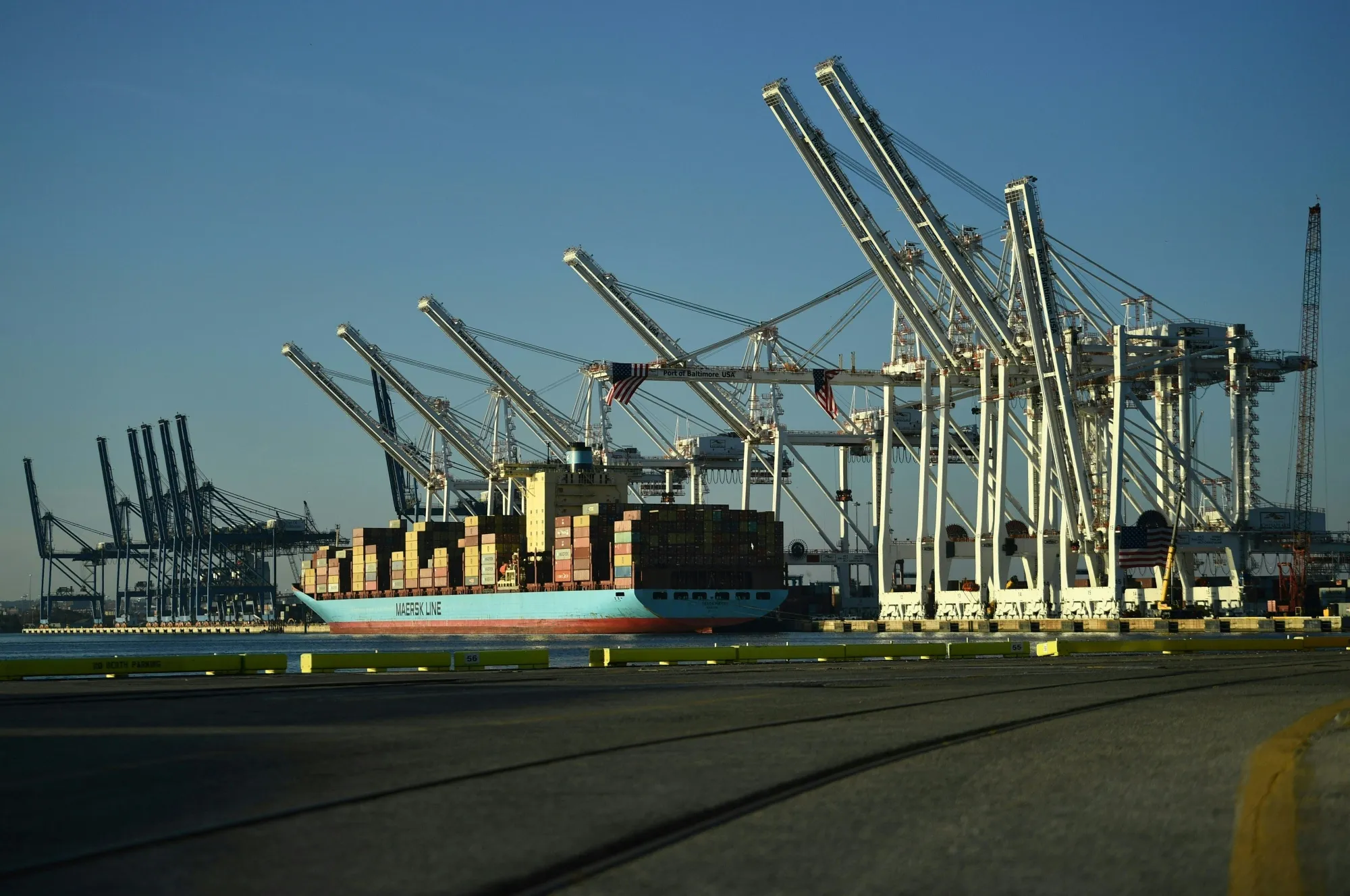 Cranes stack cargo containers at the Port of Baltimore in Maryland.