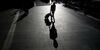 A man walks near the Roppongi Hills complex in Tokyo, Japan.