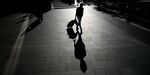 A man walks near the Roppongi Hills complex in Tokyo, Japan.