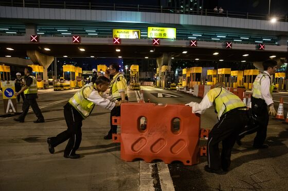 Police Fire Tear Gas to Protect China Office: Hong Kong Update