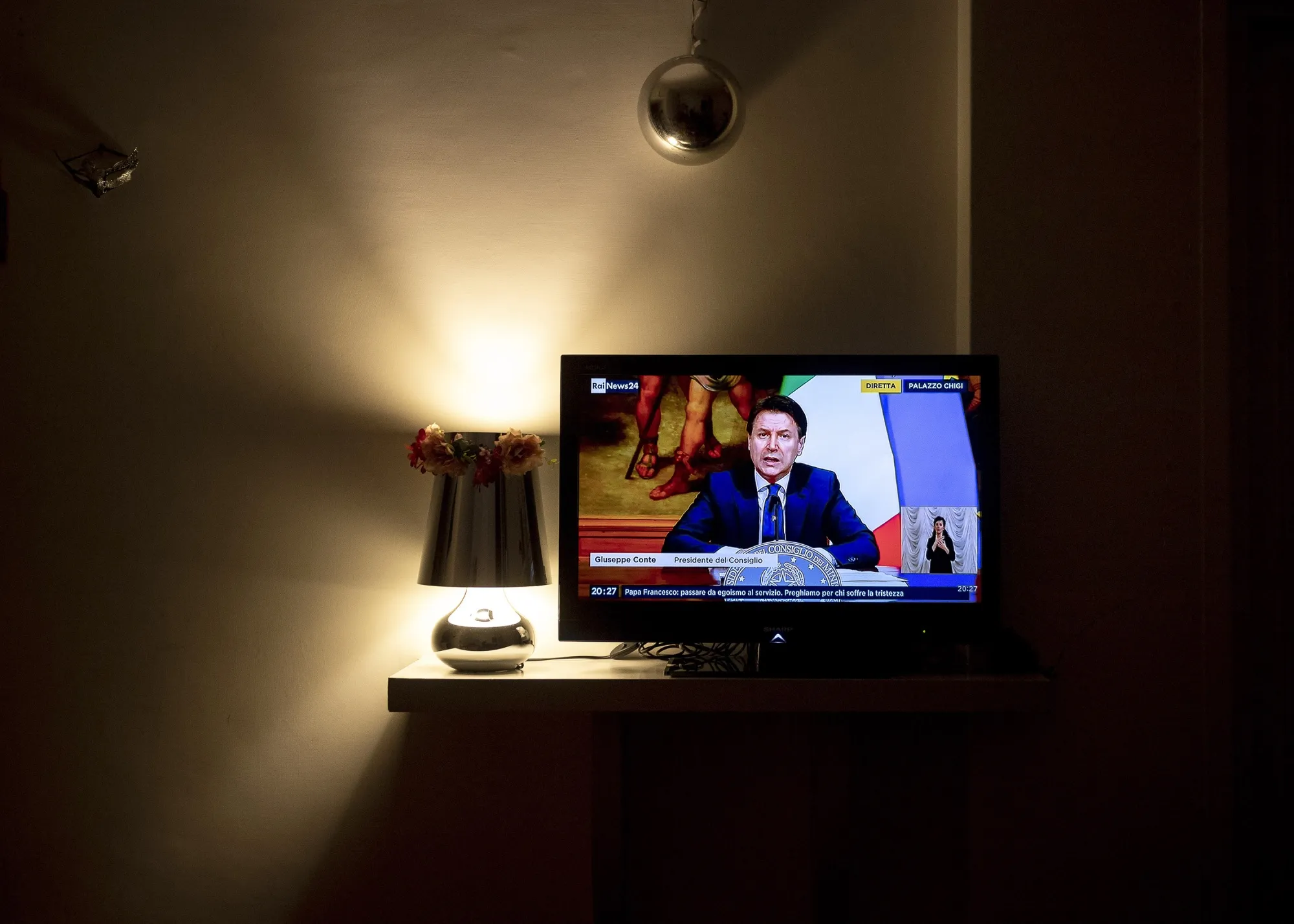 Giuseppe Conte&nbsp;appears on a television screen during a live broadcast, in Rome, on April 26.&nbsp;